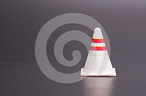 Road traffic cone isolated over dark background,road traffic concept