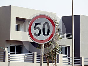 A road traffic sign in Egypt that gives an alert to drivers 50 fifty kilometer per hour is the maximum speed limit, over 50 KM