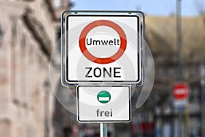 Road traffic sign marking a low emission zone in city centers in Germany translating as `Environmental Zone`