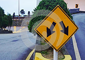 A road traffic sign into two branches