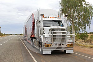 Transport by road train in the Australian Outback, Australia photo