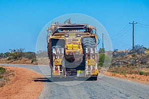 Road Train oversize load transport in Australia transporting big mining equipment
