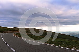 Road on the transalpina route in Romania.  It is placed on the top of a mountain near Urdele Pass