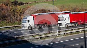 Road transport - two lorries on the motorway