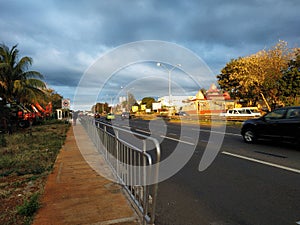 road transport walkway evening infrastructure lane city street morning waterway town highway downtown vehicle bridge dusk board