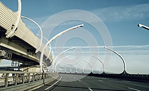 road transportation sunlight blue sky bridge streetlight