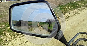 Reflected road in rearview mirror