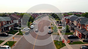 Road traverses scenic US suburb, a picturesque setting for road enthusiasts. Ideal for showcasing road life in tranquil