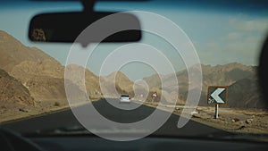 Road trip by highway in desert. Adventure Travel in a desert road in Egypt, full hd