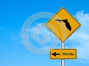 Road trip to Florida  map of  Florida with sky background.