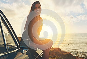 Road trip, vintage sunset and woman in portrait by sea for travel, journey and happy summer vacation. Youth, gen z