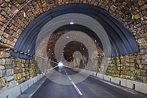 Road tunnel in alpine mountains