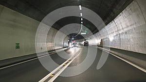 Road tunnel with cars