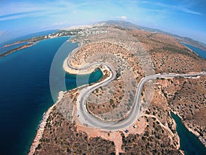 Road with turns made by a drone on the seashore w