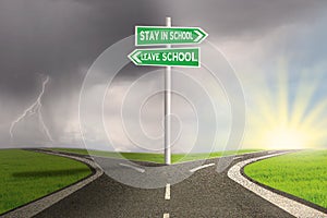 Road with two choices to stay or leave school