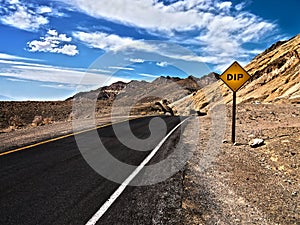 Road under cloudy sky