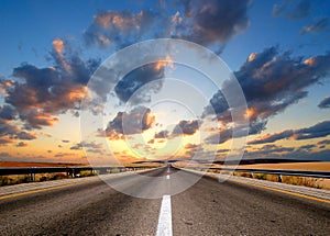 Road under cloudy sky