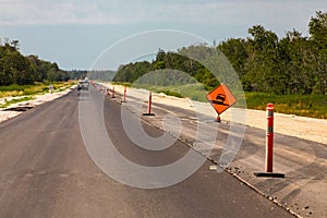 Road under construction with new asphalt