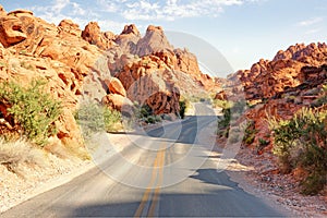 Road through the Valley of Fire State Park in the morning, Nevada, United States. Toned image