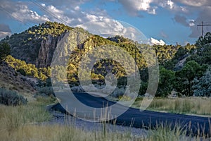 Road with view of Goshen Canyon under cloudy sky