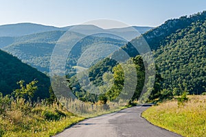 A road and view of mountains in the rural Potomac Highlands of West Virginia