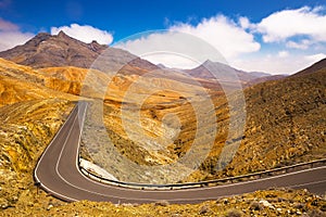 Road in vulcanic landscape of Fuerteventura Island, Canary Island, Spain, Europe. photo