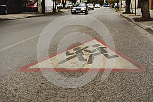 Road warning sign `cautiously children ` painted on the road. Danger. Attention