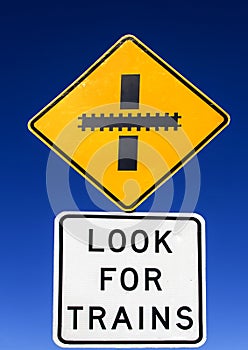 Road warning sign - Look for Trains