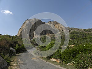 Road which leads to big granite hills and cave temple