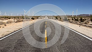 Road through the wind turbines fields in the desert in southern California, Ocotillo, CA, USA