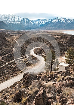 A road winds its way through the rocky landscape