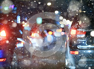 Road in winter night traffic jams
