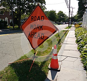 Road Work Ahead Sign with Orange Reflective Traffic Safety Cone