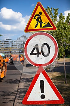 Road work, speed limit and other dangers signs