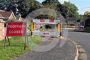 Road work warning signs and barriers.