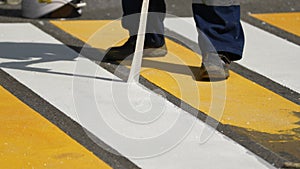 road works. painting of a pedestrian crossing. Road repair industry asphalt construction traffic transport