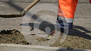 road works. painting of a pedestrian crossing. Road repair industry asphalt construction traffic transport