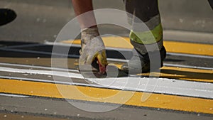 road works. painting of a pedestrian crossing. Road repair industry asphalt construction traffic transport