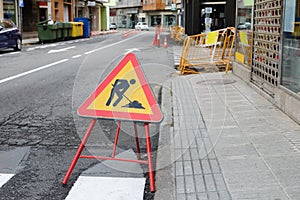 Road works sign on the side of the road