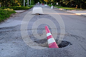 Road works. Warning signs. Replacement of the road surface. City streets