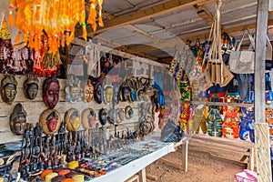 Roadside arts dealer along a street in Yamoussoukro Ivory Coast Cote d`Ivoire West Africa.