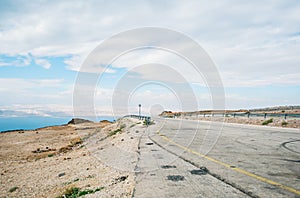 Roadside of the asphalt road along the coast of the Mertovy sea in Jordan