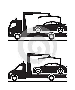 Roadside assistance truck and pickup with car
