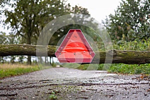 Roadside car warning triangle on the ground