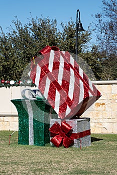 Roadside display of gift-wrapped Christmas gifts