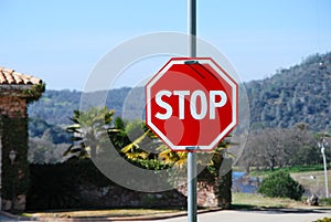 Roadside red stop sign is perfect new