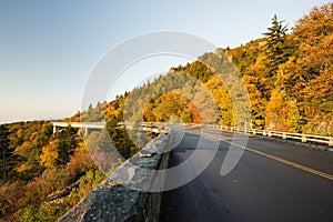 Roadway and bridge in the mountains during fall and fall colors