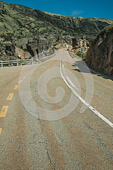 Roadway passing through rocky landscape