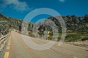 Roadway passing through rocky landscape