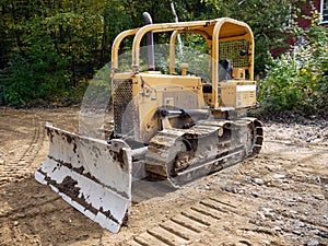 Roadworks: grader on building site